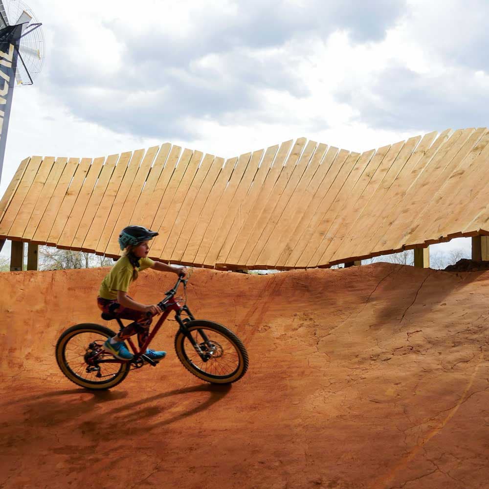 Rider flowing through the berms